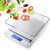 Rechargeable food scale with digital display and clear cover, suitable for precise weighing of ingredients in grams and ounces.